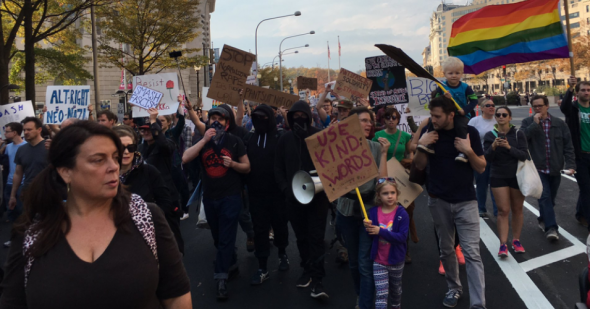 Demonstrators marched down Pennsylvania Avenue in Washington, DC on Saturday, November 19 to protest the racism and fascim of the far-right National Policy Institute. (Photo: Lacy MacAuley/Twitpic)