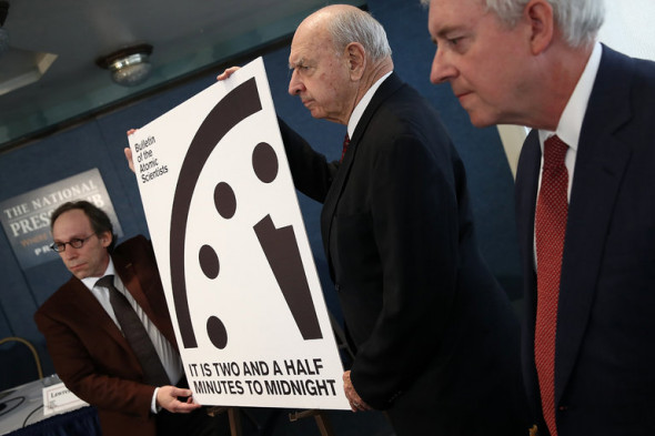 Members of the Bulletin of Atomic Scientists with the updated Doomsday Clock in Washington. The New York Times – Credit Win Mcnamee/Getty Images