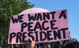 A sign at a Bernie Sanders rally in Washington D.C. on June 9, 2016. (Photo credit: Chelsea Gilmour)
